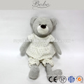 grey stuffed baby bear nursery toy with pajamas